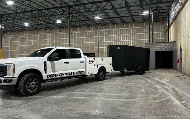 CCS service truck and equipment trailer staged for emergency dispatch
